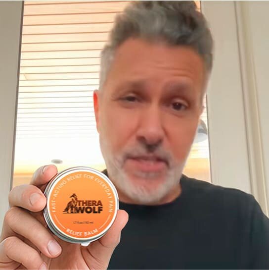 Ashton H. holding TheraWolf Neuro Balm